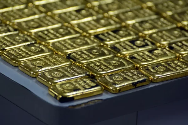 Close up stack of gold bars.